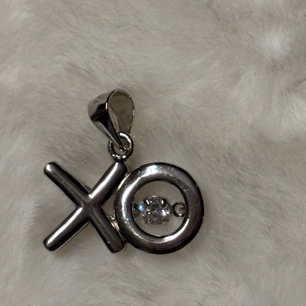 Sterling silver sim. Diamond XO charm pendant only new no tags